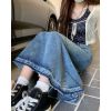 Ảnh của Chân váy jean cạp cao dài qua gối, chân váy dài tua gấu phong cách A25