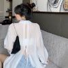 Ảnh của Áo sơ mi voan tay phồng KABICO áo sơ mi nữ xẻ sau khoác ngoài mặc đi biển, du lịch form rộng dài tay mỏng nhẹ