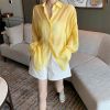 Ảnh của Áo sơ mi voan tay phồng KABICO áo sơ mi nữ xẻ sau khoác ngoài mặc đi biển, du lịch form rộng dài tay mỏng nhẹ